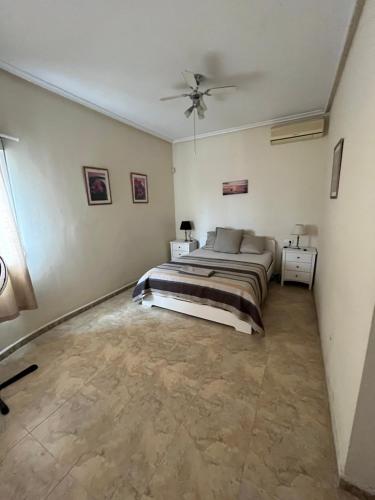 Ένα ή περισσότερα κρεβάτια σε δωμάτιο στο Charmante villa
