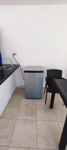 Photo de la galerie de l'établissement Villa acogedora en urb cerca del Malecon Salinas, à Salinas