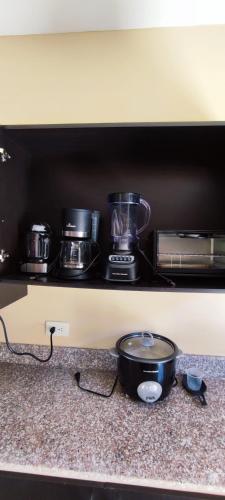 Cuisine ou kitchenette dans l'établissement Villa acogedora en urb cerca del Malecon Salinas