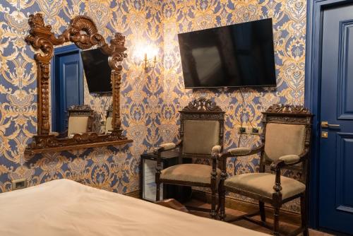 Televisyen dan/atau pusat hiburan di Castle Boutique Hotel