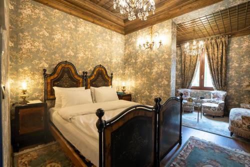 Katil atau katil-katil dalam bilik di Castle Boutique Hotel