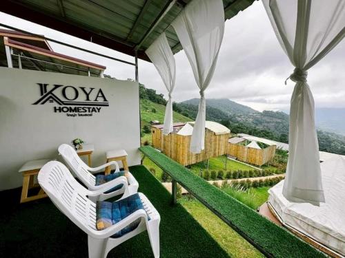 a view from the balcony of a luxury villa at Koya Homestay โกญ่า โฮมสเตย์ in Mae Rim