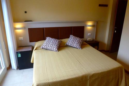 Katil atau katil-katil dalam bilik di Hotel Versilia