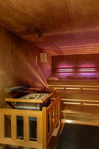 an empty kitchen with a stove in a room at M4 Apartments in Freiburg im Breisgau