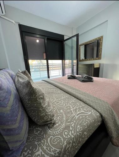 Postel nebo postele na pokoji v ubytování Monika Apartment