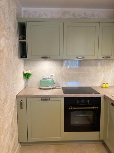 Η κουζίνα ή μικρή κουζίνα στο Coccolina, studio apartment with private hot tub, breathtaking views and free parking, bookable all year round, Also take a look at our flat Amor