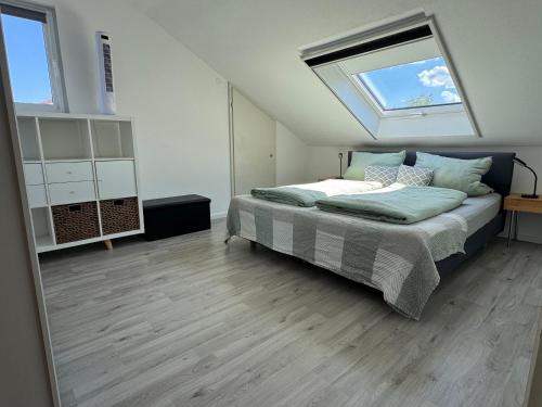 Katil atau katil-katil dalam bilik di Gemütliche Wohnung bei Bad Waldsee mit Balkon
