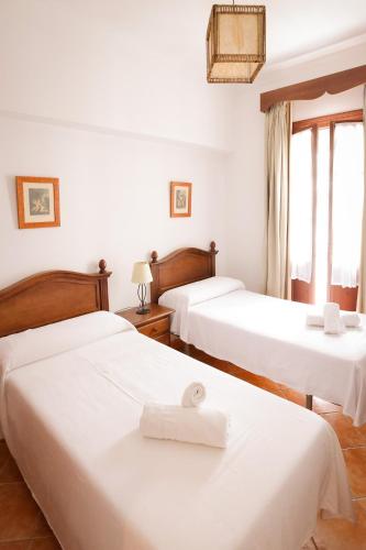 Ένα ή περισσότερα κρεβάτια σε δωμάτιο στο Apartamento Juan Relinque 1 - Hello Vejer