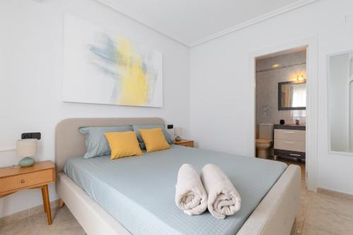 Un pat sau paturi într-o cameră la Casa del sol - la Zenia