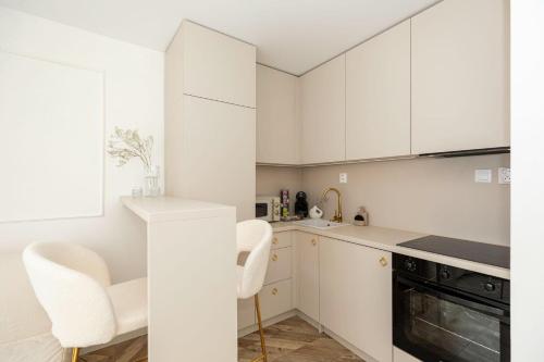 Kuchyň nebo kuchyňský kout v ubytování ADEVAM apartman v Banskej Bystrici