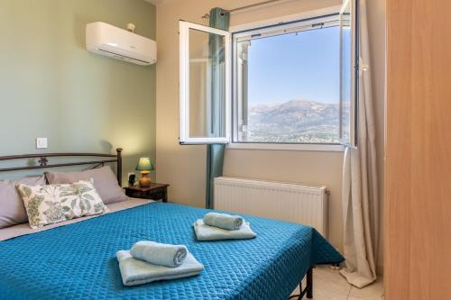 Posteľ alebo postele v izbe v ubytovaní Apaggio di Argostoli Apartments - private parking & sea view