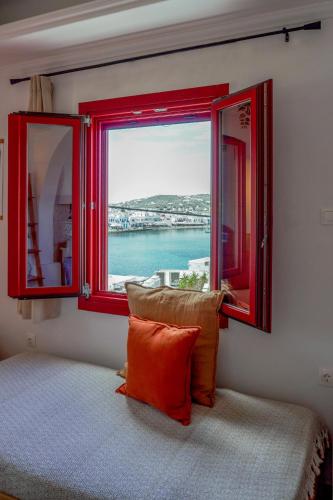 Ένα ή περισσότερα κρεβάτια σε δωμάτιο στο Arodou Studio and Apartment