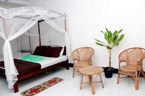 Χώρος καθιστικού στο Tamasha Mango Home stay