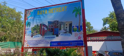 ein großes Schild am Straßenrand in der Unterkunft Raya Retreat Resort in Alībāg