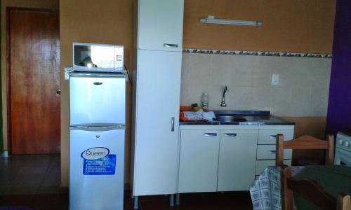 Cucina o angolo cottura di Cabañas en Termas de Guaviyú, Paysandú, Uruguay