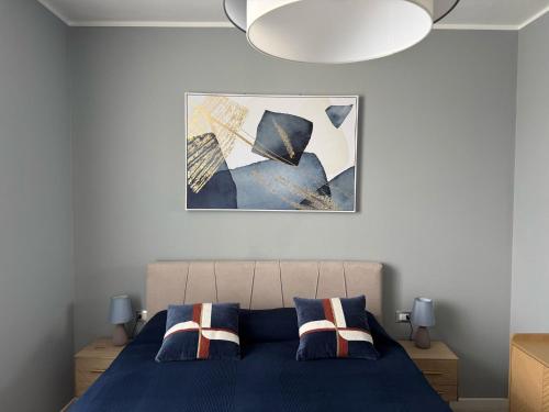Ένα ή περισσότερα κρεβάτια σε δωμάτιο στο Flat 14 Lecco Lake