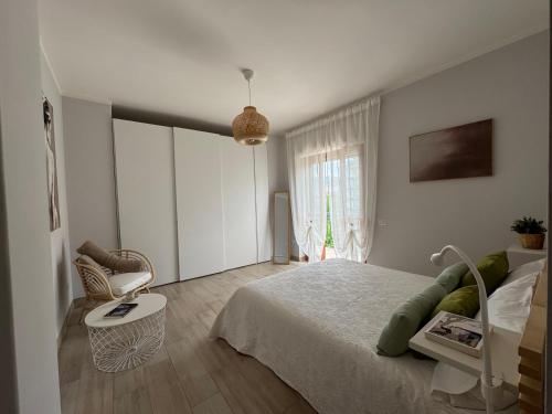 Ένα ή περισσότερα κρεβάτια σε δωμάτιο στο Casa Vacanze Dant