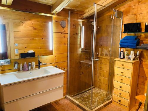 a bathroom with a shower and a sink at Golfweg 'Home away from home' in Reith bei Kitzbühel