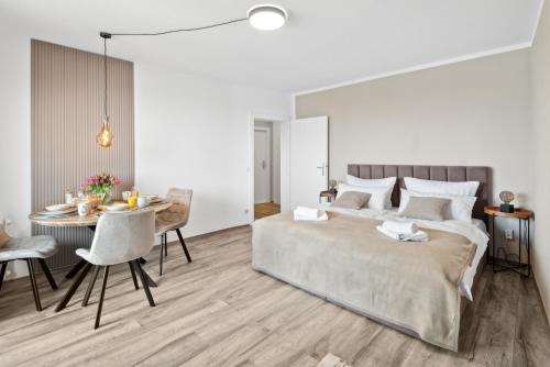 Ένα ή περισσότερα κρεβάτια σε δωμάτιο στο Fewo 7Home Apartment zentrumsnah NEU