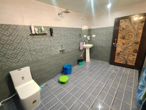 Koupelna v ubytování Neeta Homestay