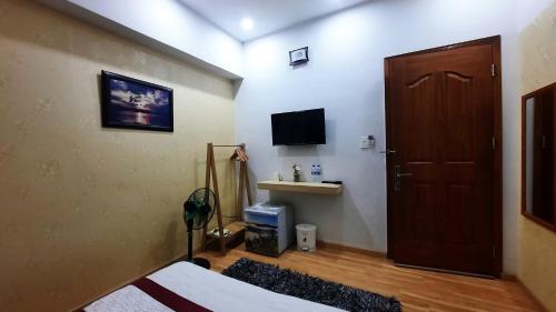 TV a/nebo společenská místnost v ubytování NEST House