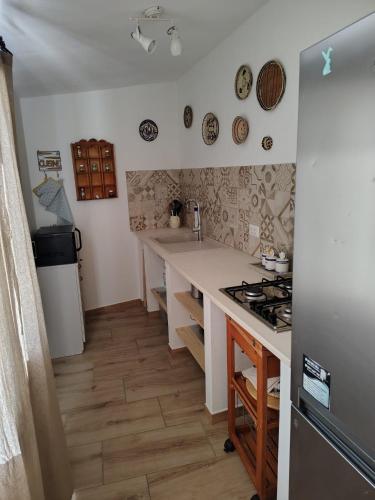 Kuchyň nebo kuchyňský kout v ubytování Casa Emma