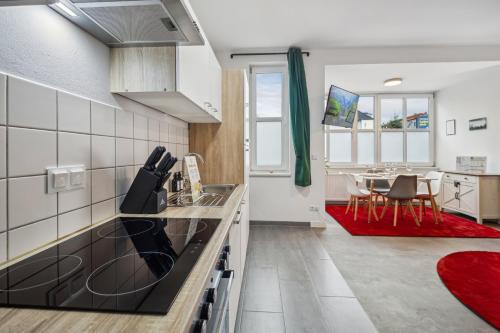 Cucina o angolo cottura di Believe Inn - Spremberg 4 Personen, Küche, Smart TV, Parkplatz