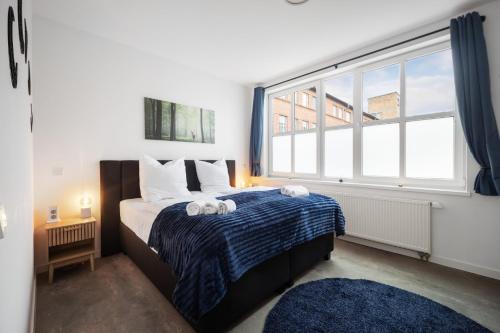 Letto o letti in una camera di Believe Inn - Spremberg 4 Personen, Küche, Smart TV, Parkplatz