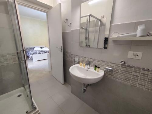 a bathroom with a sink and a shower at Villa Luciana in Fano