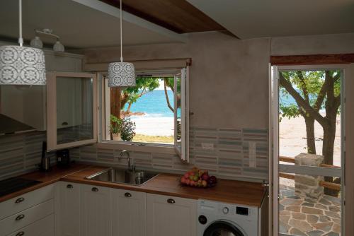 Gallery image of The Sea Rock House in Agii Saranta