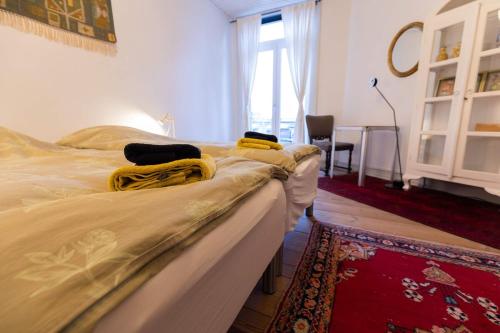 En eller flere senge i et værelse på Lejlighed i Holstebro gågade