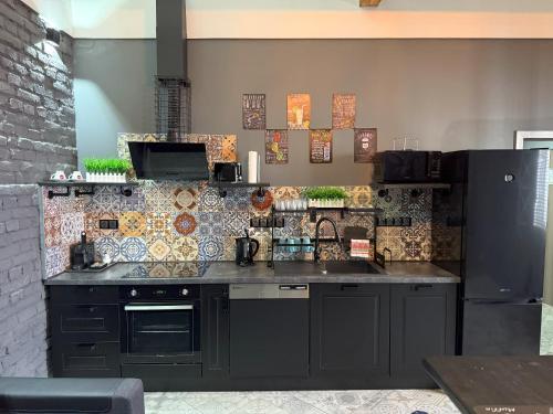 Una cocina o zona de cocina en Residence IRON CUBE