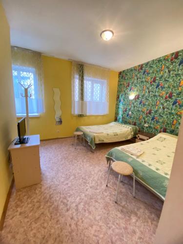 Postel nebo postele na pokoji v ubytování Osobyi Guest house