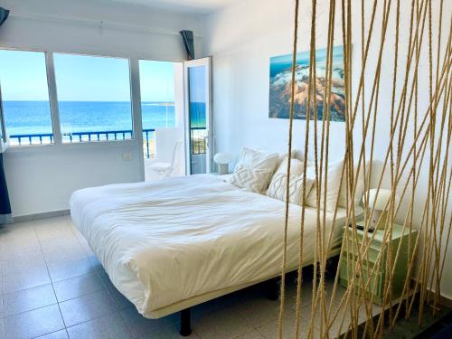 Postel nebo postele na pokoji v ubytování Weybeach3 ocean frontline,sea view,private terrace