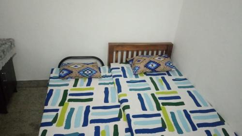 Ένα ή περισσότερα κρεβάτια σε δωμάτιο στο Rest Room, Kanjiramkulam, Trivandrum