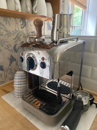 a coffee maker sitting on top of a counter at 5 min from the water's edge in Strøby