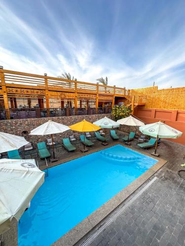 Bazén v ubytování Sunset Luxury Dahab nebo v jeho okolí