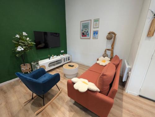Una televisión o centro de entretenimiento en Thebreak - Une parenthèse chic de détente et de divertissement