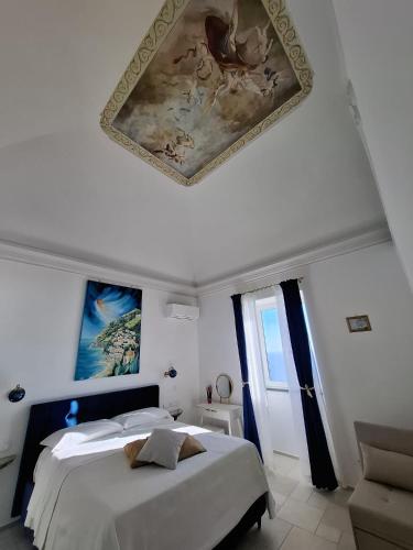 Кровать или кровати в номере Aladea Home Praiano Amalfi Coast