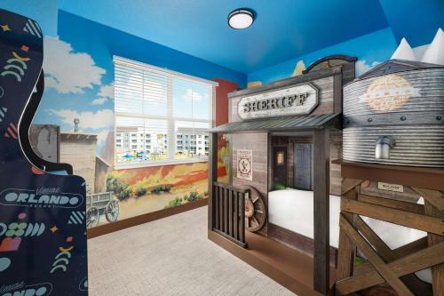 a childs bedroom with a train themed room at Villatel Orlando Resort, Apartments by Marriott Bonvoy in Orlando
