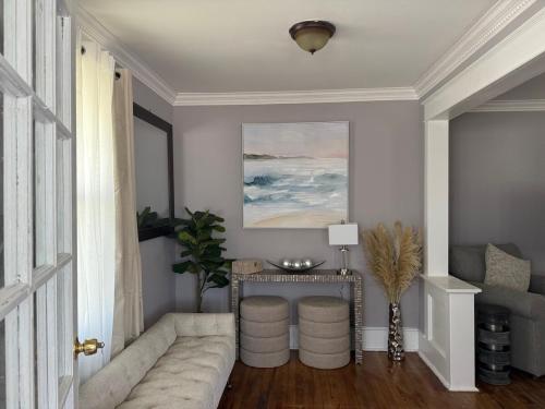 a living room with a couch and a table at Quiet retreat Atlantic City in Atlantic City