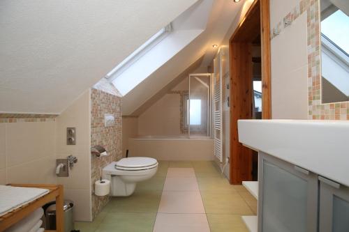 Koupelna v ubytování Ferienwohnung im Vogelhaus mit Dachterasse und großem Garten