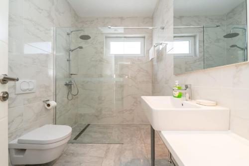 Kúpeľňa v ubytovaní Apartment Deluxe Villa Carlotta
