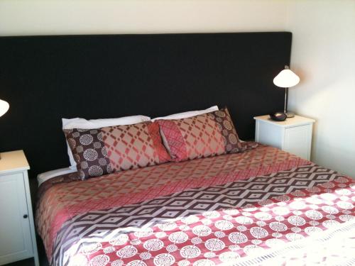 Postel nebo postele na pokoji v ubytování Adelaide - Semaphore Beach Front