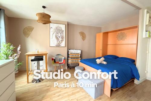 Ένα ή περισσότερα κρεβάτια σε δωμάτιο στο Studio Confort & Calme - Paris à 10 min