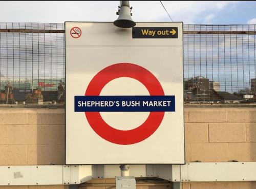 a sign that reads way outs just market at 7even Clouds Oasis- Stylish Apartment Near Westfield in London