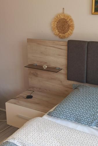 Una cama o camas en una habitación de Kuća Despot