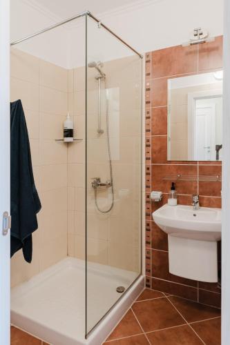 a bathroom with a shower and a sink at Sozopol Созопол- SOZOPOLIS -MORE SUN 2А- in Sozopol