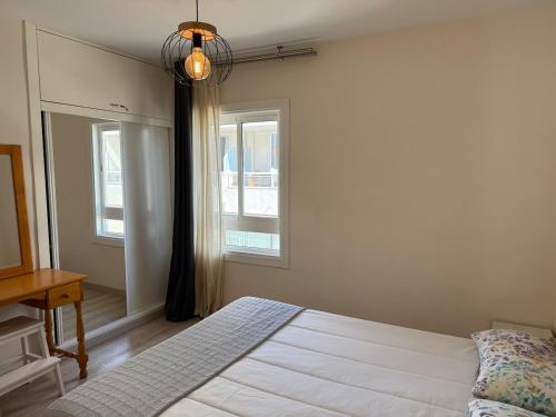 Centrally located M, bright and sunny apartment with terrace and pool views
