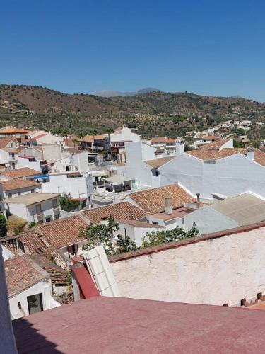 a view of a town with white buildings at Casa Rincón de Monda in Monda